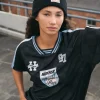 WMNS FOOTBALL TEE BLACK/GLACIER